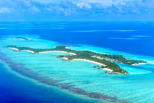 Maldives Villas With Hammocks Suspended Above Reefs